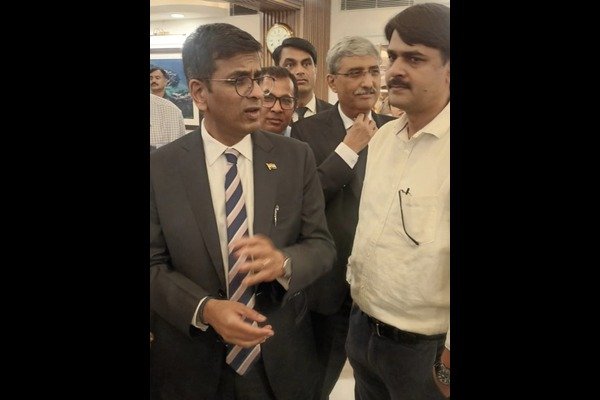 Prabhakar Mishra with former CJI justice Chandrachud